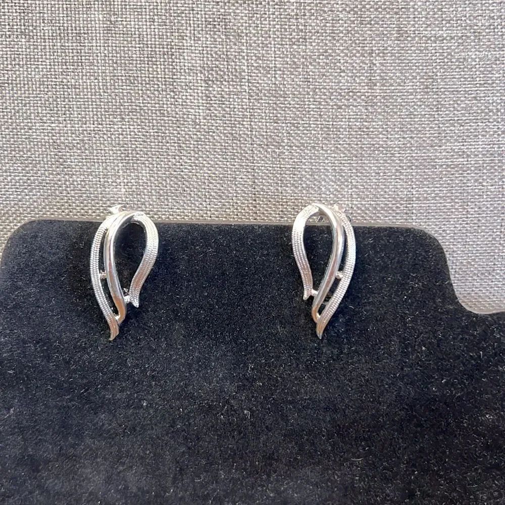 Lovely Sarah Coventry Openwork Swirl Design Clip-On Earrings